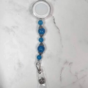 blue cracked glass badge reel
